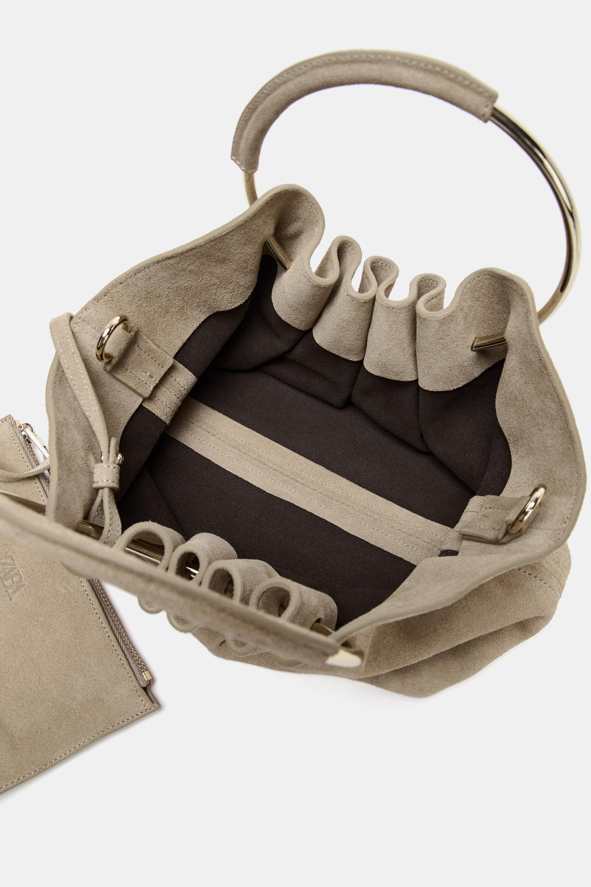RIGID HANDLE SPLIT LEATHER BUCKET BAG